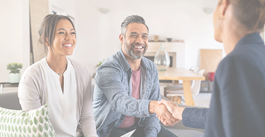 Couple Shaking hands with doctor